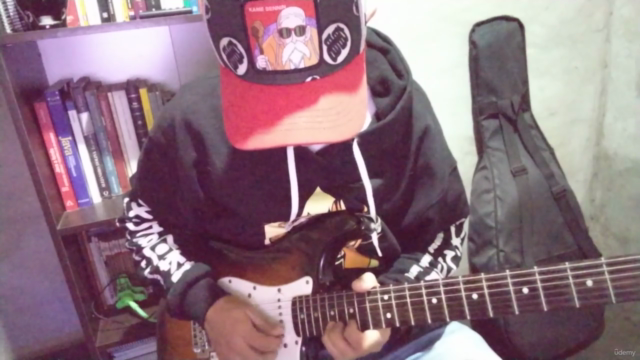 Cómo tocar Hard Rock y Heavy Metal en la Guitarra Eléctrica – Screenshot 1